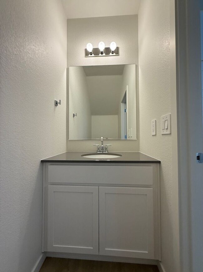 Building Photo - New 2 Bedroom Townhome + 2 Car Garage