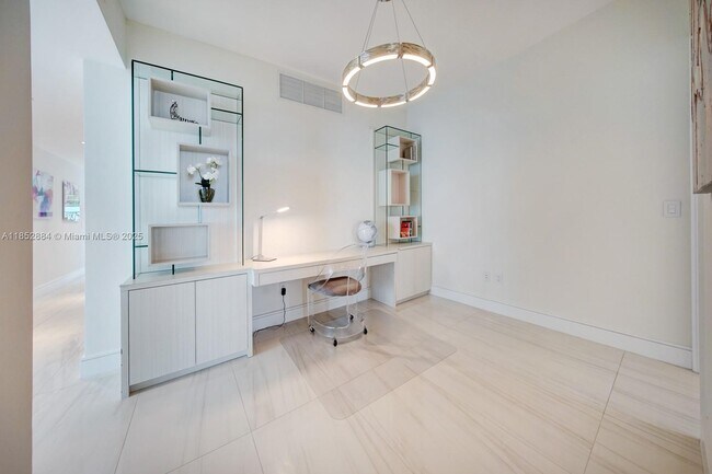 Building Photo - 10203 Collins Ave