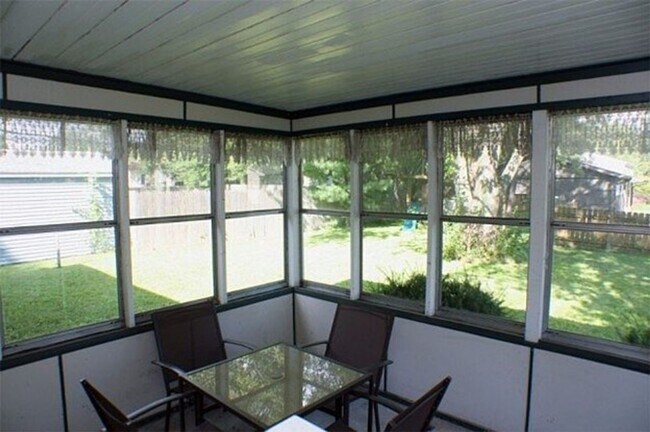 Building Photo - Corner Lot Charm: Spacious 3-Bed Home with Fireplace and Prime Location