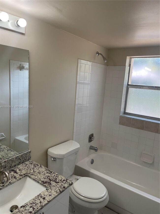 Building Photo - 10818 Royal Palm Blvd