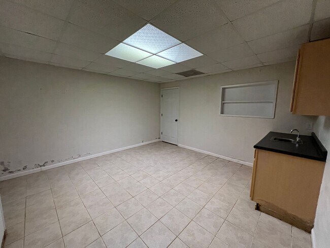 Building Photo - Unit is no longer available - application approved.  Charming 1 1/2 story brick home with basemen...