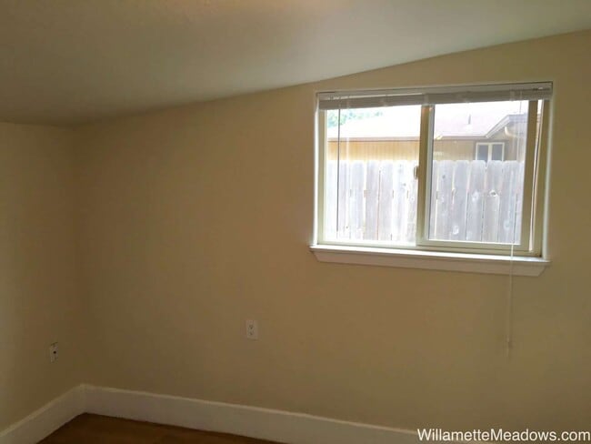 Building Photo - Spacious 4-Bedroom Home with Large Fenced Yard & Covered Patio