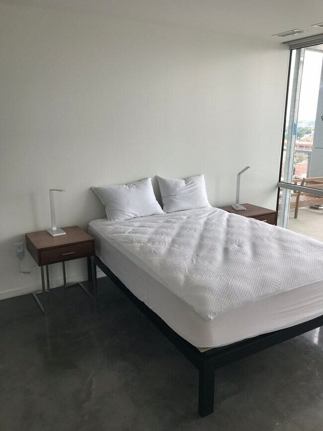 Building Photo - AVAILABLE AUGUST 2026 - Downtown Iowa City High-Rise Condo with Amazing Views