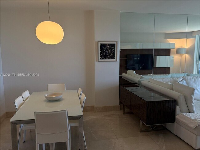 Building Photo - 10275 Collins Ave