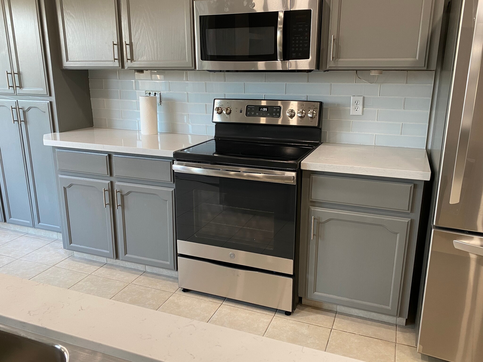 kitchen; new glass tile backsplash - 1134 Pine Ct