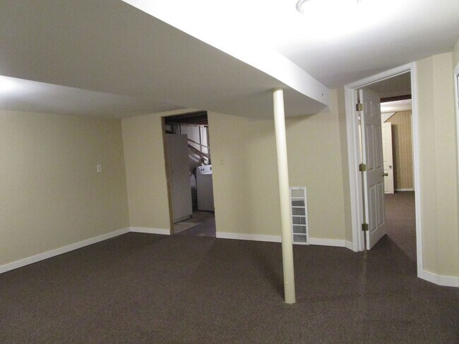 Building Photo - Privacy Fence and a Garage!