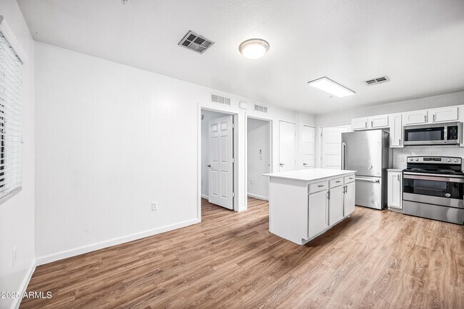 Building Photo - 3065 N 67th Ave