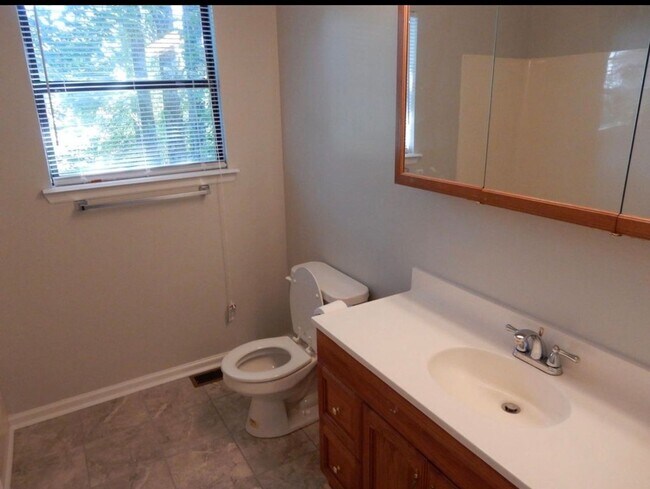 Building Photo - Nice zero lot line 3/2 with exterior out building by Carter Realty Advisors,LLC
