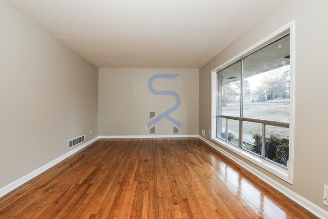 Building Photo - Move in before February 15th and choose your reward: a $250 Amazon Gift Card or a 55" Smart TV!