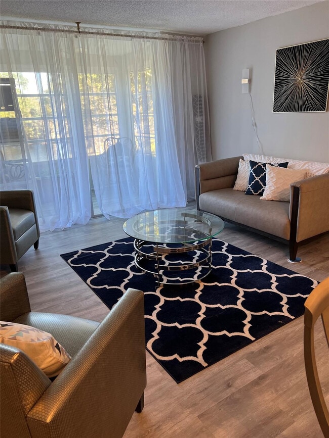 Building Photo - 9070 Lime Bay Blvd