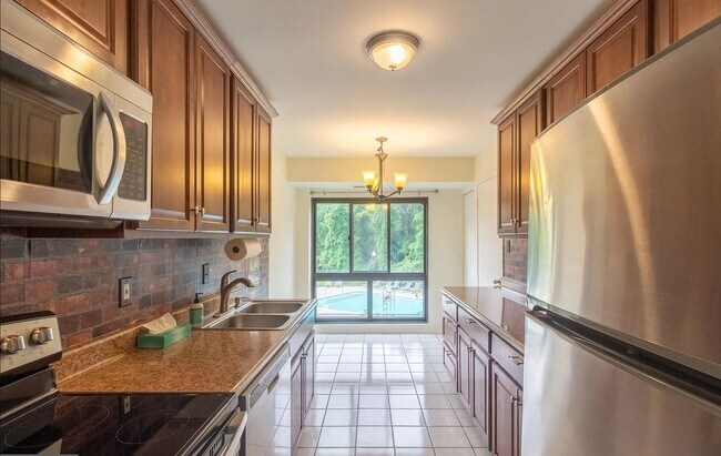 Kitchen - you can set up a breakfast nook by the window - 12730 Veirs Mill Rd