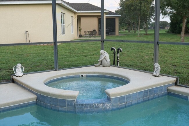 Building Photo - 4 Bedroom Pool Home Available Now!