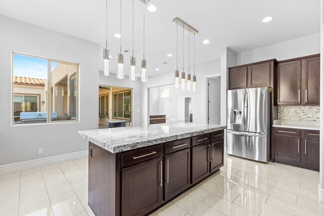 Building Photo - Canyon Falls Single-Story: Chef’s Kitchen, Office + Built-In BBQ Yard (3-Car)