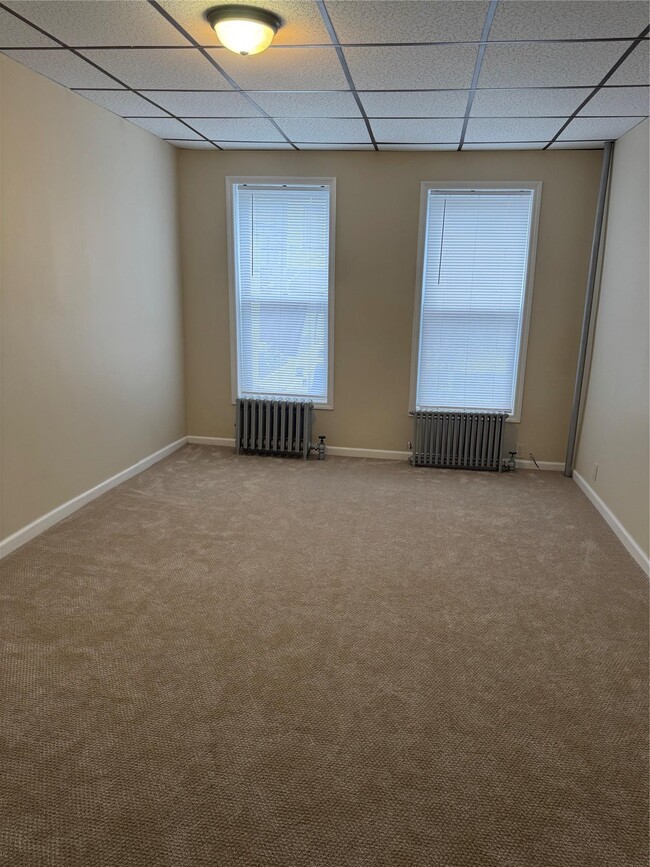 Building Photo - 62-21 60th Dr