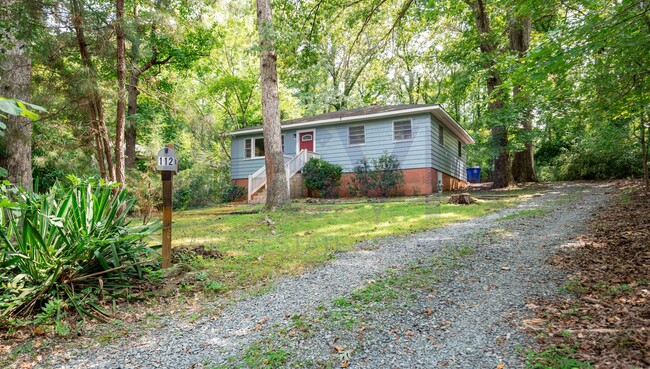 Building Photo - LOVELY HOME WITH HARDWOOD FLOORS!