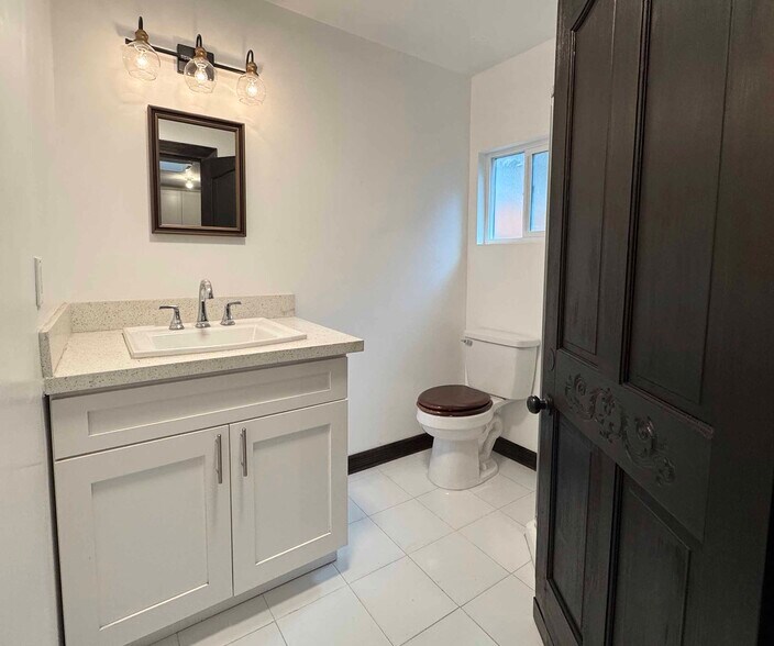 bathroom with shower - 1108 N Sweetzer Ave