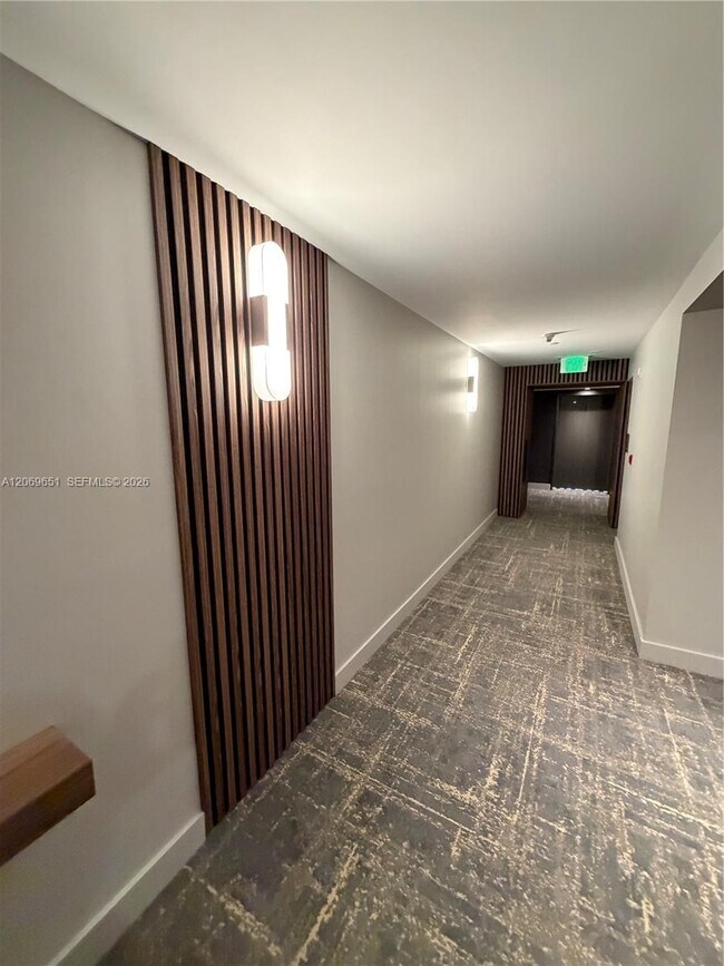 Building Photo - 6365 Collins Ave