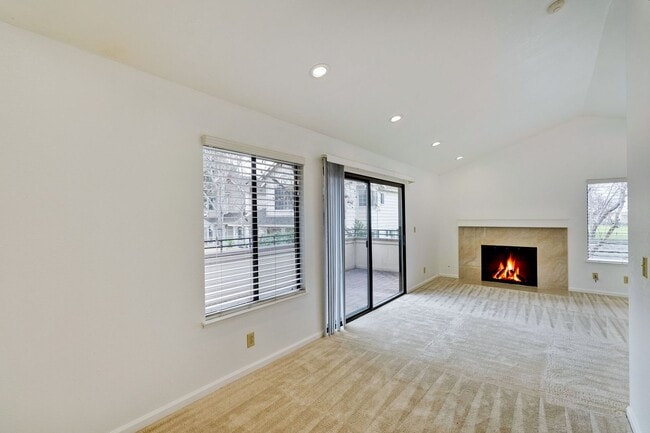 Building Photo - Spacious condo available in desirable Newpark Village community!