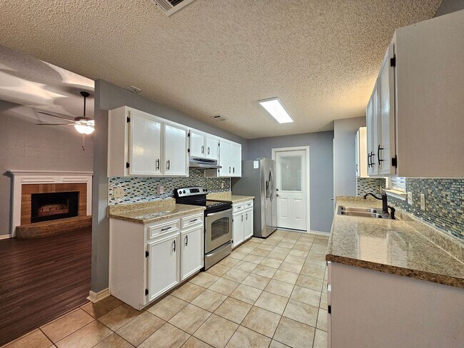 Building Photo - NEW IN MANAGEMENT - AVAILABLE NOW!