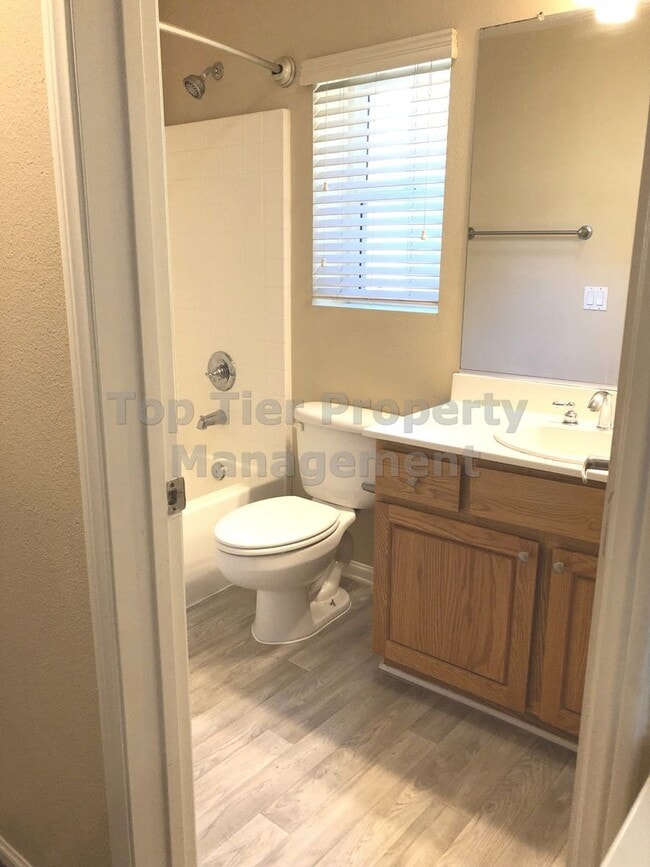 Building Photo - **Gated 3 bed, 3 bath Townhome with 2-Car ...