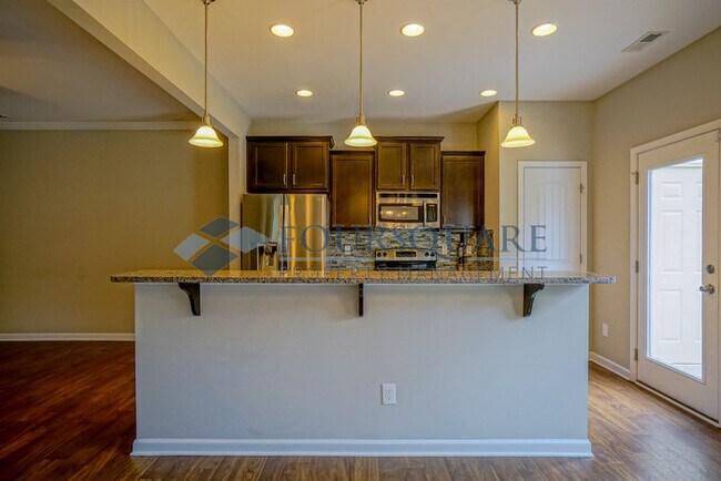 Building Photo - Spacious 3-Bed, 2.5-Bath Townhome with Was...