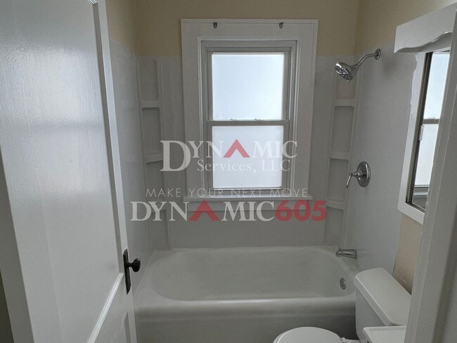 Building Photo - 4+ Bedroom, 2 Bath House with Garage and Fenced Backyard