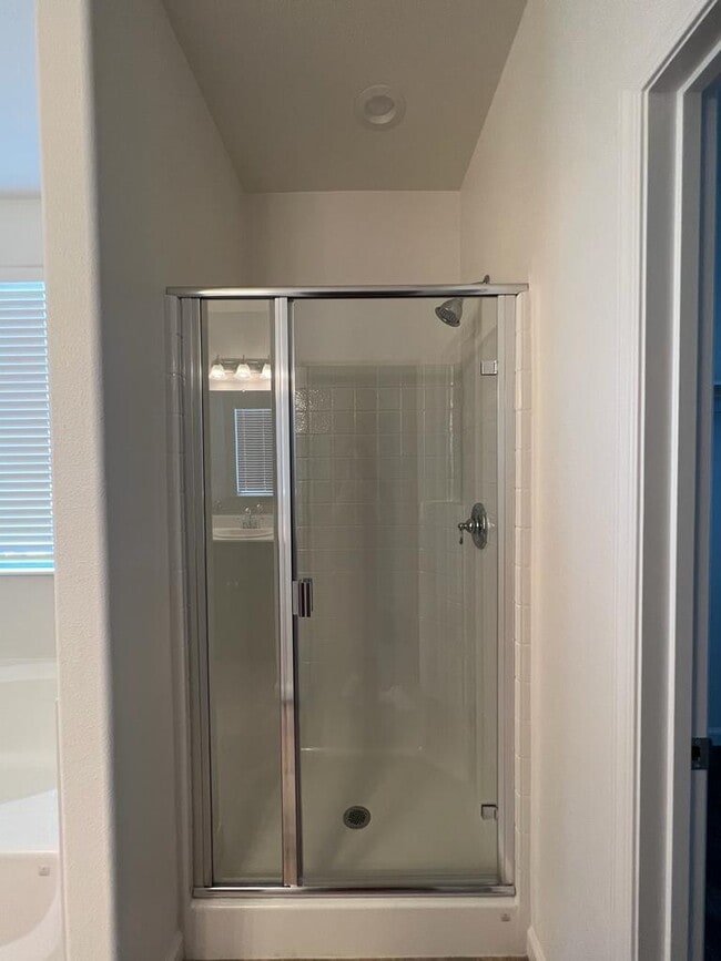 Building Photo - Welcome to modern living in a secure, gated community!