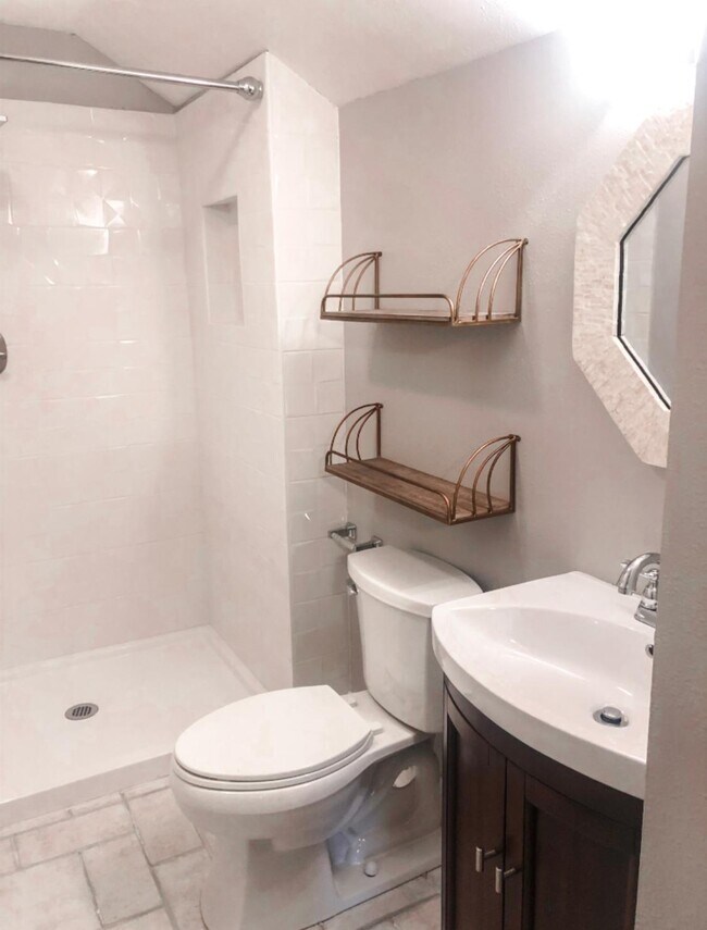 Newly renovated upstairs bathroom - 2113 Toledano St