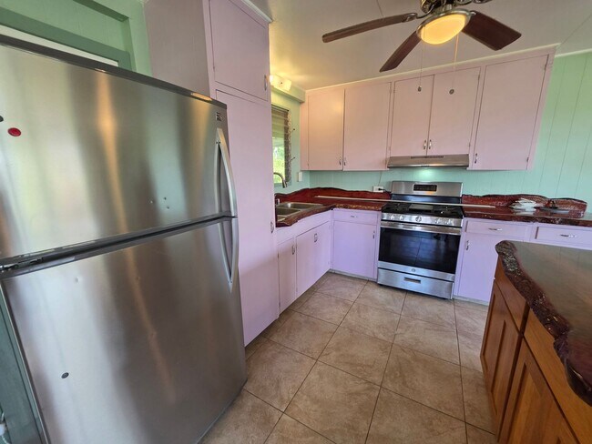 Building Photo - Available July 1 | Flexible 5-Bedroom Layout | 3.5BA Home | Secured Carport