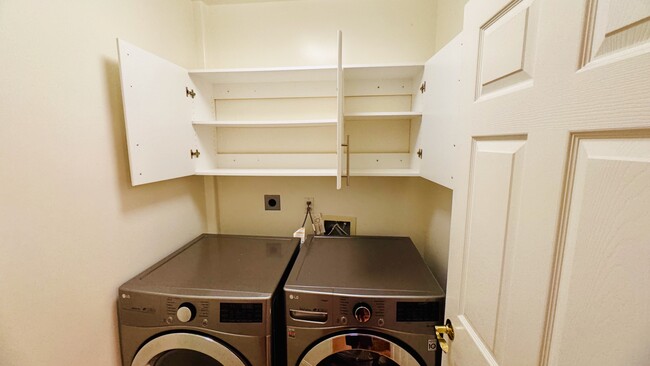 All new appliances - washer and dryer. Plenty of storage and dedicated laundry room - 2107 Plant Ave