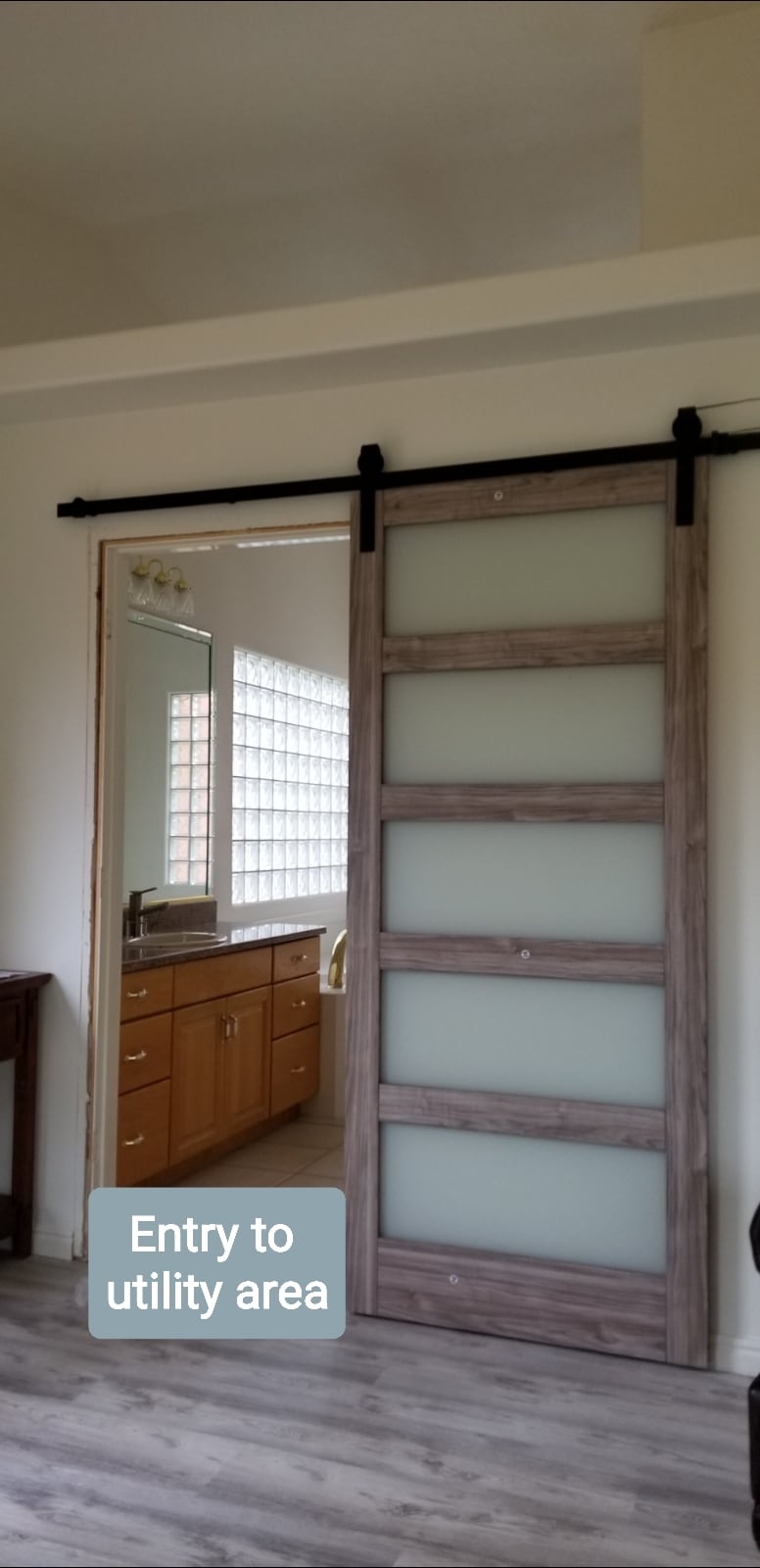 Barn door entry to utility area - 137 E 755 S