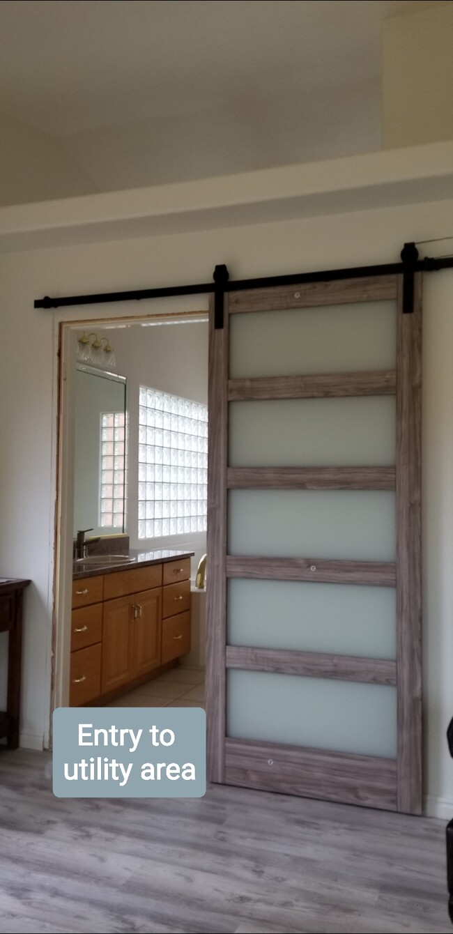 Barn door entry to utility area - 137 E 755 S