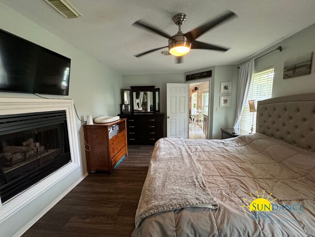 Building Photo - 4-Bedroom Home with Stunning Features, Private Oasis, and Beach Access!