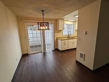 Building Photo - Available Now! Pet-Friendly 2 Bed/ 1.5 Bath with Patio & Parking