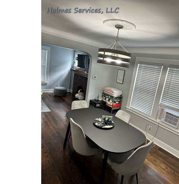 Open layout - view of dining room & living room. Showing one of the provided AC units - 526 Academy St