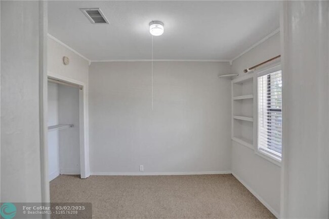 Building Photo - 450 NE 58th Ct