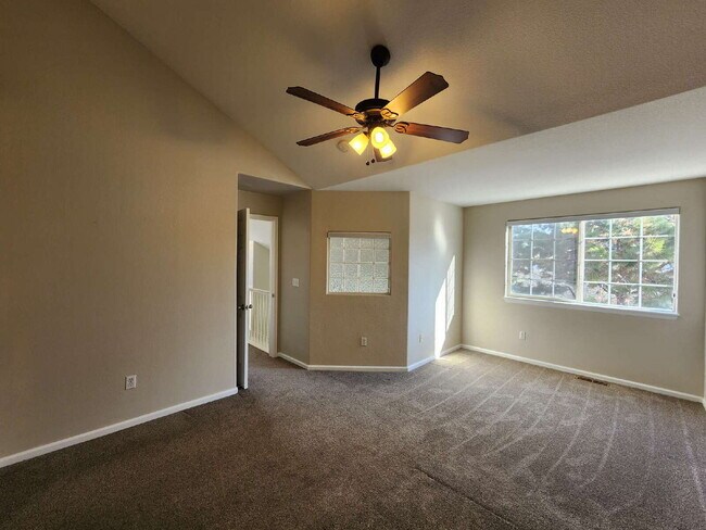 Building Photo - Spacious Two-Suite Townhome With Garage, Fireplace And Community Pool