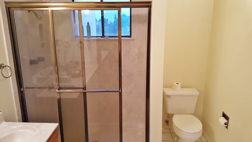 This is the shower in the master bedroom. Bathtub is available in the downstairs bath. - 6436 Saint Josephs Ave NW