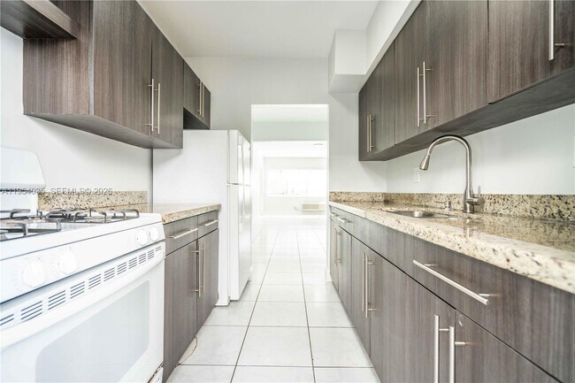 Building Photo - 8340 Byron Ave