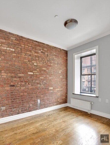 Building Photo - E 13TH ST.