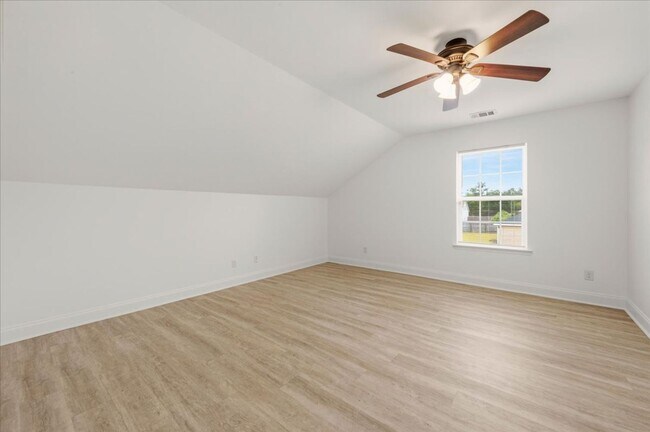 Building Photo - Spacious 5-Bedroom Home with Screened Patio & Private Fenced Yard in Guyton