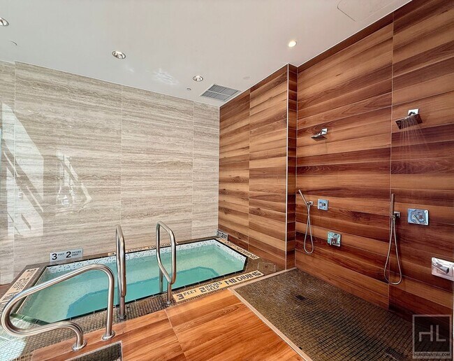 Building Photo - SUNNY NO FEE STUDIO IN THE LUXURY SUMMIT NYC