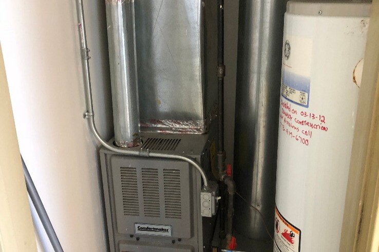 FURANCE/HOT WATER TANK - 1425 W Wilson Ave