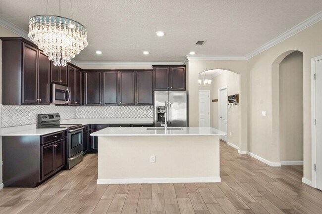 Building Photo - Beautiful 3/2 with Fully Fenced Backyard a...