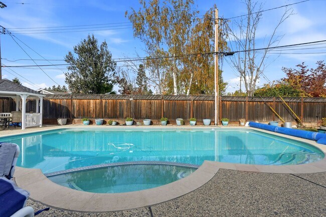 Building Photo - One-of-a-Kind Home with Pool, Gazebo, and Sunken Conversation Pit!