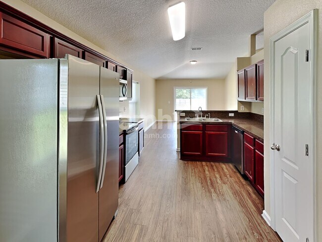 Building Photo - 6381 Louis Clark Ct