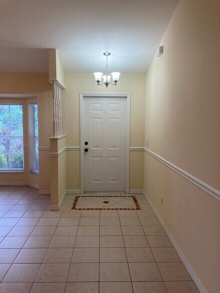 Interior front entryway with decorative tile - 3224 SW 7th Pl