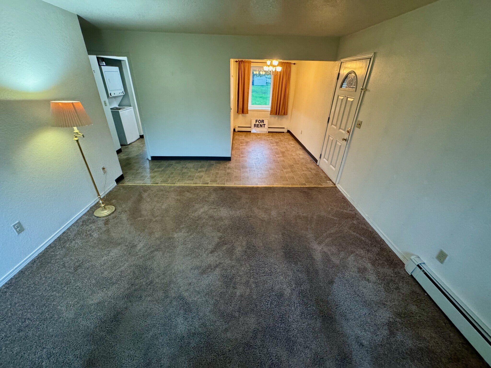 Living room stretches in to dining room. - 1503 Wolverine St