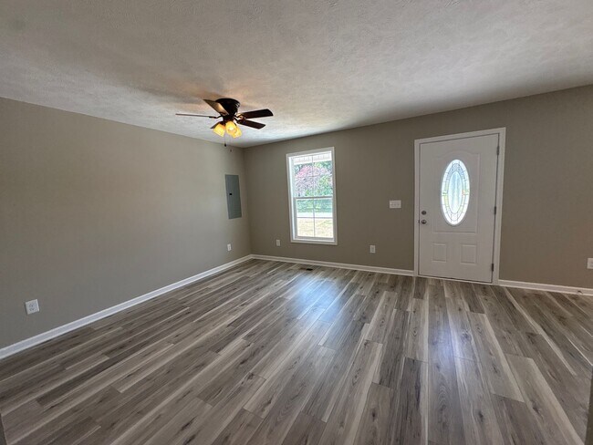 Building Photo - Charming New Home with a Rocking Chair Front Porch!