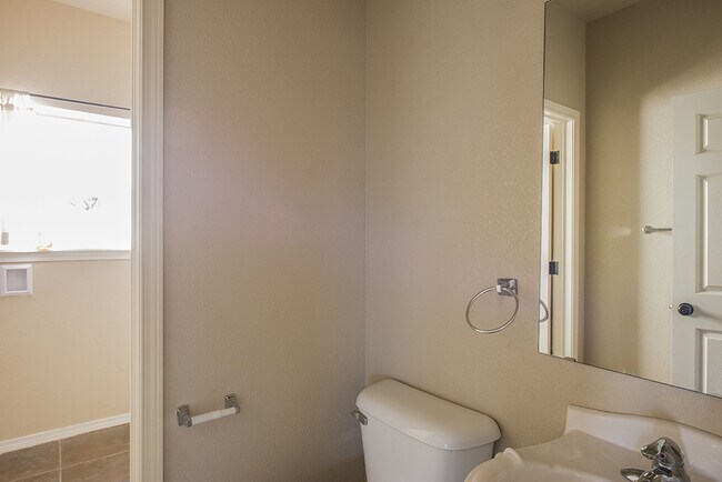 Building Photo - Beautiful 4-Bedroom Home with Custom Backy...